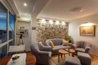 Posezení v ubytování Tsarevets panoramic apartments Veliko Tarnovo