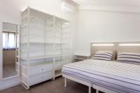 A bed or beds in a room at Bed & Bike