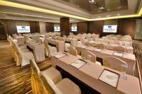 a conference room with white tables and chairs at Park Plaza Beijing Wangfujing in Beijing