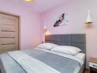 Postel nebo postele na pokoji v ubytování Apartament Porto Santa Rewales