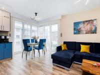 Kuchyň nebo kuchyňský kout v ubytování Apartament Porto Santa Rewales