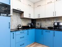Kuchyň nebo kuchyňský kout v ubytování Apartament Porto Santa Rewales