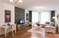 TV a/nebo společenská místnost v ubytování Turkuaz Suites Bosphorus
