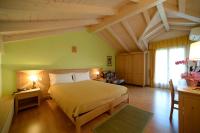 Posteľ alebo postele v izbe v ubytovaní Agriturismo Maso Grener