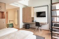 Łóżko lub łóżka w pokoju w obiekcie Stadthotel Goldenes Schiff