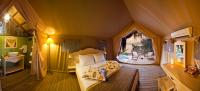 Postel nebo postele na pokoji v ubytování Perdue Hotel