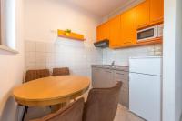Kuchyňa alebo kuchynka v ubytovaní Apartments Ivana-Mira