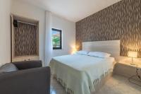 Posteľ alebo postele v izbe v ubytovaní Apartments Ivana-Mira