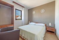 Posteľ alebo postele v izbe v ubytovaní Apartments Ivana-Mira