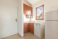 Kuchyňa alebo kuchynka v ubytovaní Apartments Ivana-Mira
