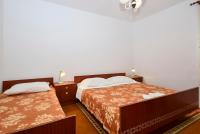 Postel nebo postele na pokoji v ubytování Apartments Silvana 597