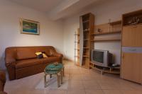 TV a/nebo společenská místnost v ubytování Apartments Nedeljka