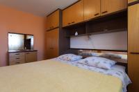 Postel nebo postele na pokoji v ubytování Apartments Nedeljka