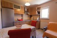 Kuchyň nebo kuchyňský kout v ubytování Apartments Nedeljka