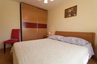 Postel nebo postele na pokoji v ubytování Apartments Nedeljka