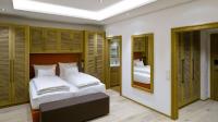 Łóżko lub łóżka w pokoju w obiekcie Hotel Diamond Country Club