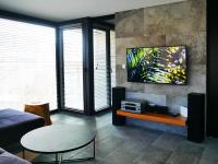 Telewizja i/lub zestaw kina domowego w obiekcie RS SUITES PRESTIGE Racławickie 10 "best view" HOME & SPA