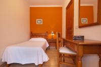 A bed or beds in a room at Pinos Altos T2 2