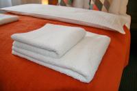 Łóżko lub łóżka w pokoju w obiekcie Apartamenty Starówka - Melody