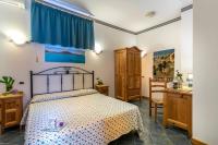 Posteľ alebo postele v izbe v ubytovaní Alba Marina B&B