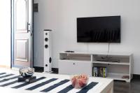 TV a/nebo společenská místnost v ubytování Famara Sunshine