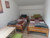 Postel nebo postele na pokoji v ubytování Penzion Réva