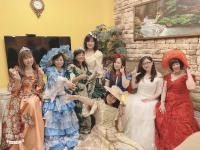 a group of women dressed in costumes posing for a picture at Jane Castle in Wujie