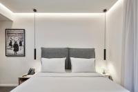 Posteľ alebo postele v izbe v ubytovaní NLH MONASTIRAKI - Neighborhood Lifestyle Hotels