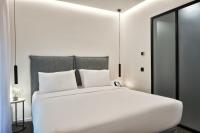 Posteľ alebo postele v izbe v ubytovaní NLH MONASTIRAKI - Neighborhood Lifestyle Hotels