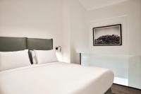 Posteľ alebo postele v izbe v ubytovaní NLH MONASTIRAKI - Neighborhood Lifestyle Hotels
