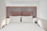 Posteľ alebo postele v izbe v ubytovaní NLH MONASTIRAKI - Neighborhood Lifestyle Hotels