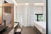Televízia a/alebo spoločenská miestnosť v ubytovaní NLH MONASTIRAKI - Neighborhood Lifestyle Hotels
