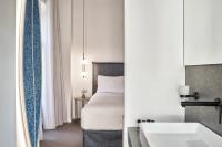 Posteľ alebo postele v izbe v ubytovaní NLH MONASTIRAKI - Neighborhood Lifestyle Hotels