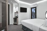 Posteľ alebo postele v izbe v ubytovaní NLH MONASTIRAKI - Neighborhood Lifestyle Hotels