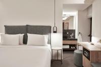 Televízia a/alebo spoločenská miestnosť v ubytovaní NLH MONASTIRAKI - Neighborhood Lifestyle Hotels