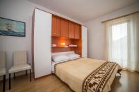 Posteľ alebo postele v izbe v ubytovaní Apartments Brižić
