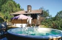 a hot tub in front of a house at Amazing Home In Basse-sur-le-rupt With 3 Bedrooms, Sauna And Wifi in Basse-sur-le-Rupt