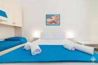 Posteľ alebo postele v izbe v ubytovaní LE 4 PERLE Apartments
