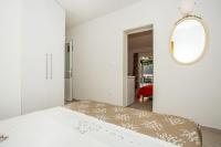 Postel nebo postele na pokoji v ubytování Apartments Robert