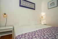 Postel nebo postele na pokoji v ubytování Apartments Robert