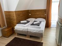 Postel nebo postele na pokoji v ubytování Rusałka