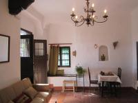 Posedenie v ubytovaní Apartamentos Rurales Las Caleras
