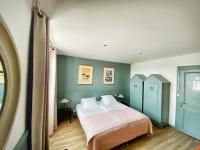 Hotel L'Océanにあるベッド