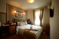 Postel nebo postele na pokoji v ubytování Anzac Hotel