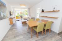 TV a/nebo společenská místnost v ubytování Apartamentos Tigaiga Suites