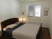 Postel nebo postele na pokoji v ubytování Apartments Tamara