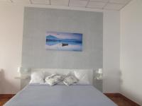 A bed or beds in a room at El Manantial