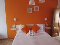 A bed or beds in a room at El Manantial