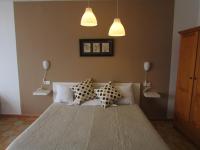 A bed or beds in a room at El Manantial