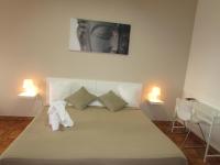 A bed or beds in a room at El Manantial